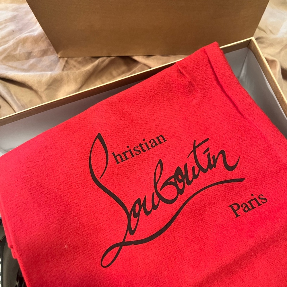Brand new. Never worn. Too small.  Tag and receipt available. Box and cloth bag